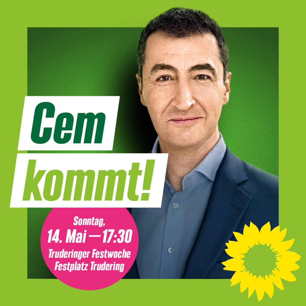 Plakat mit Überschrift Cem kommt. Es ist Cem Özdemir zu sehen, so wie das Logo der Grünen, eine gelbe Sonnenblume.